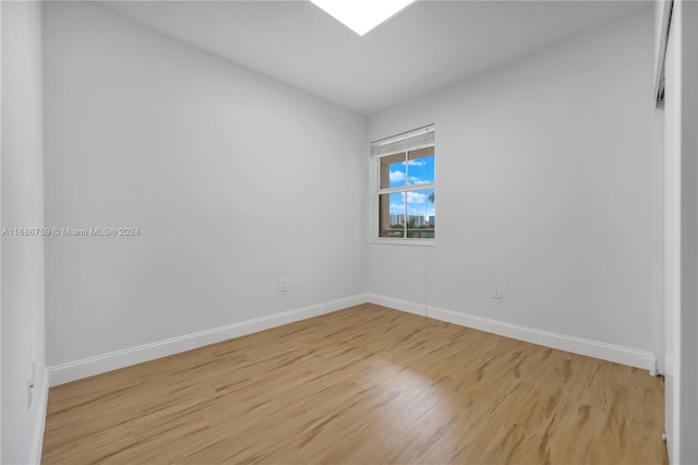 unfurnished room featuring light hardwood / wood-style flooring