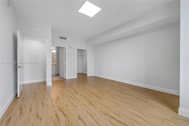 unfurnished bedroom featuring light hardwood / wood-style flooring