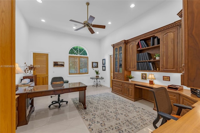 office area featuring ceiling fan and light tile patterned flooring