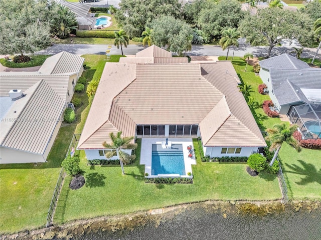 drone / aerial view with a water view