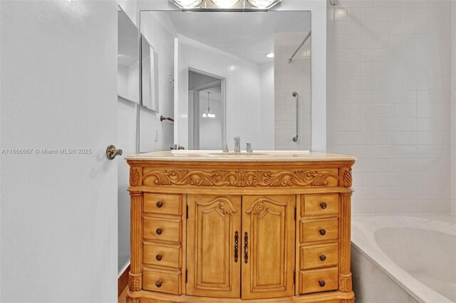 bathroom with vanity and separate shower and tub