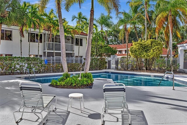 view of swimming pool featuring a patio area