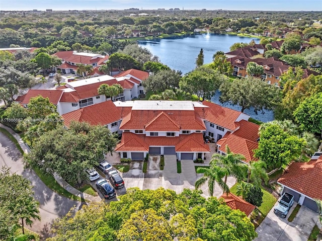 aerial view with a water view and a residential view