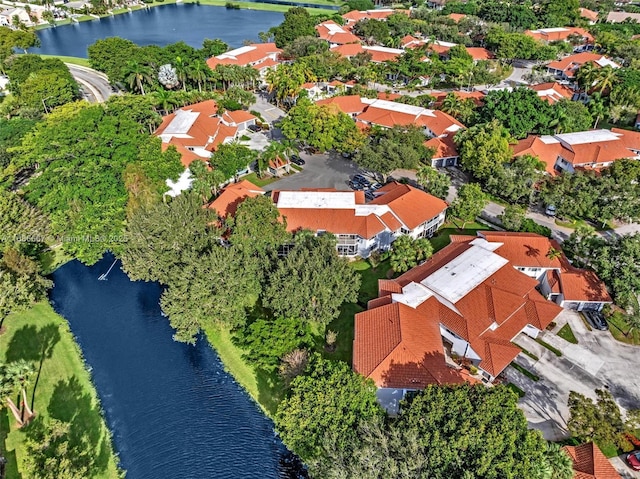 aerial view featuring a residential view and a water view