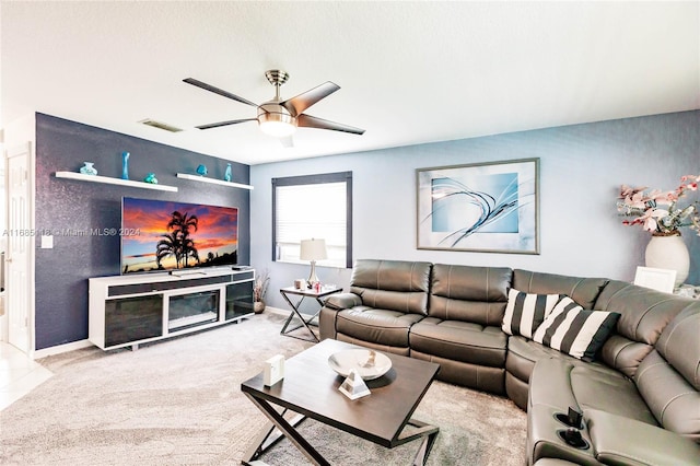 living room with light colored carpet and ceiling fan