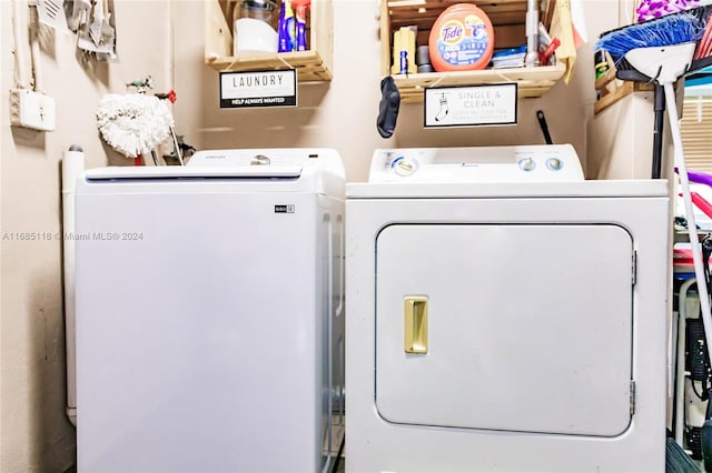 laundry room with washer and dryer