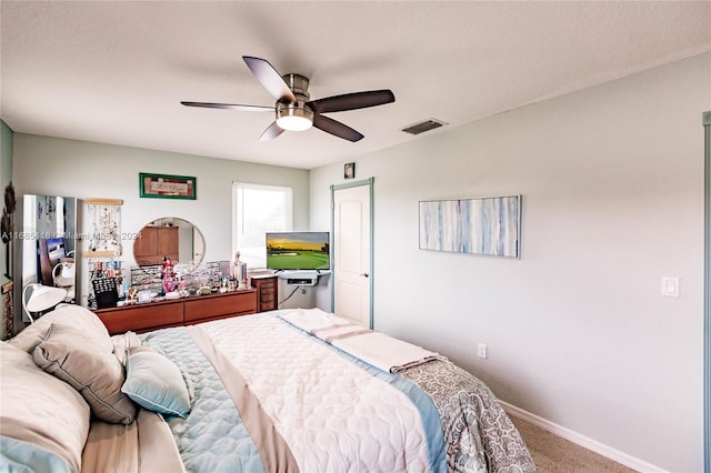 carpeted bedroom with ceiling fan