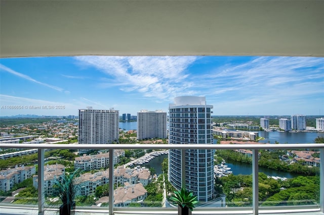 balcony featuring a water view