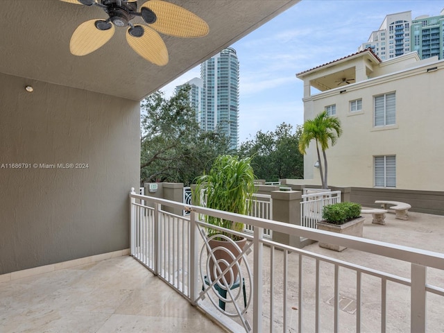 balcony featuring ceiling fan