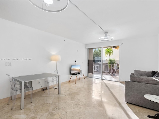 living room with ceiling fan