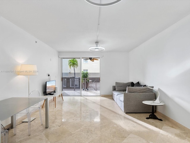 living room with ceiling fan