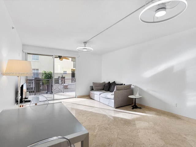 living room featuring ceiling fan