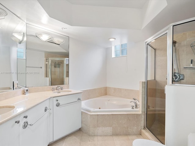 bathroom with vanity, shower with separate bathtub, and tile patterned floors