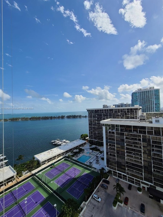 birds eye view of property featuring a water view