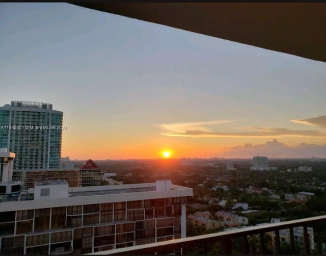 view of balcony at dusk