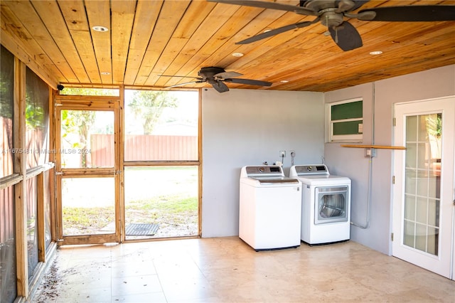 washroom featuring ceiling fan, wooden ceiling, and separate washer and dryer