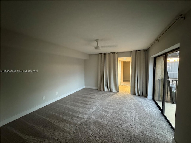 unfurnished room featuring carpet floors