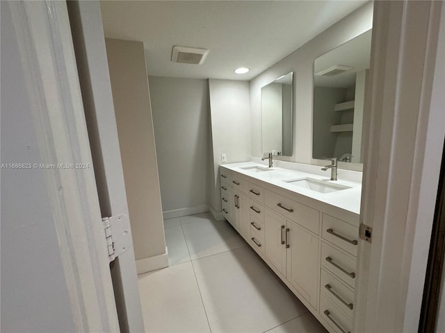 bathroom featuring vanity and tile patterned flooring