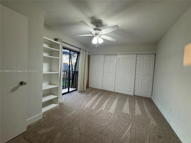 unfurnished bedroom with carpet floors and ceiling fan