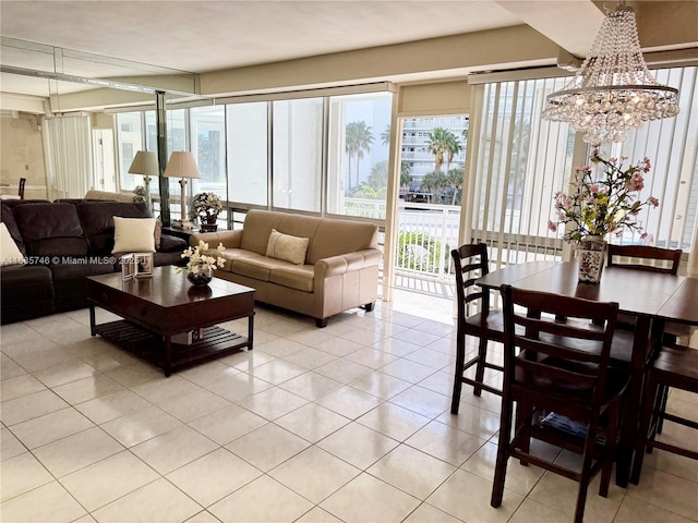 tiled living room featuring a notable chandelier