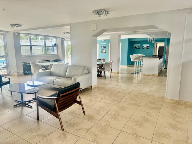 living room with light tile patterned floors