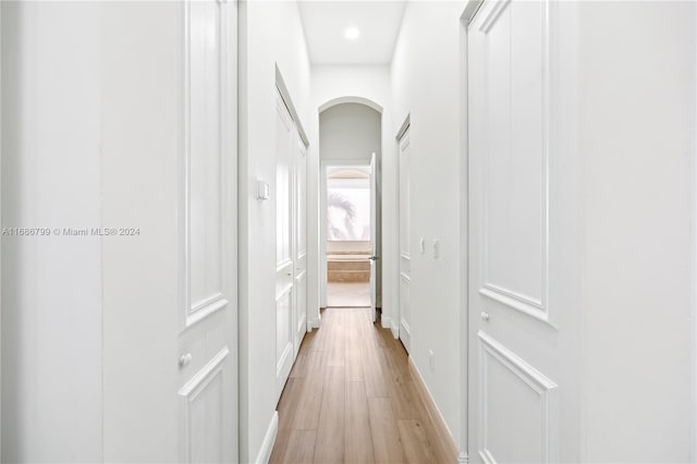 corridor featuring light wood-type flooring