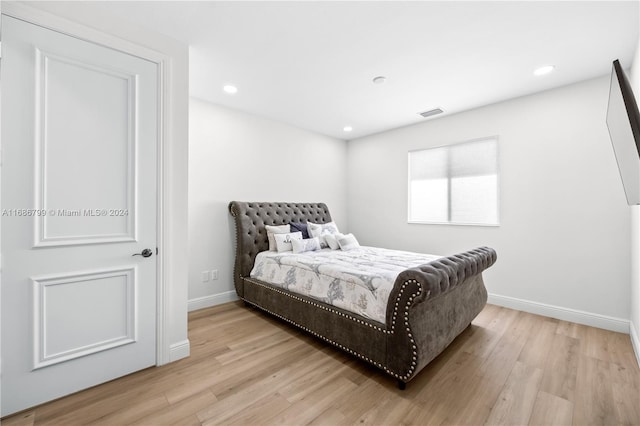 bedroom featuring light wood-type flooring