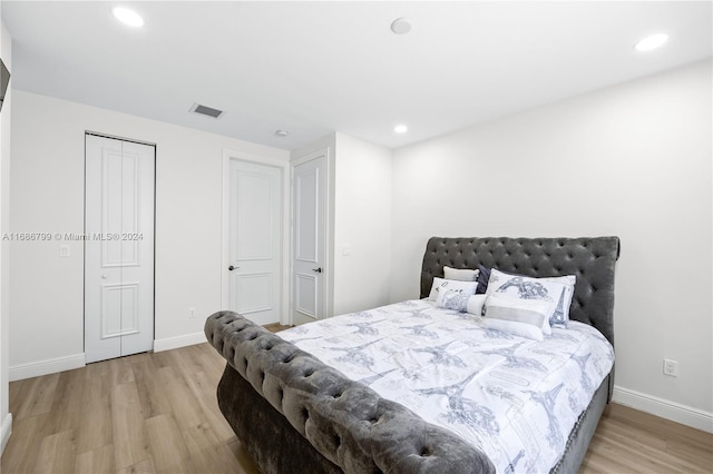 bedroom featuring light hardwood / wood-style flooring