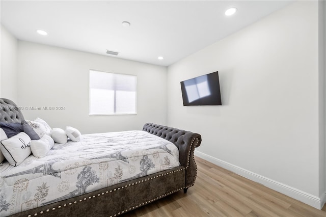 bedroom featuring hardwood / wood-style floors