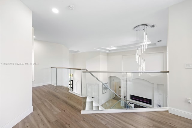 corridor featuring light hardwood / wood-style flooring