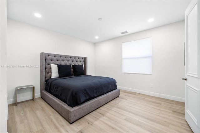 bedroom with light wood-type flooring