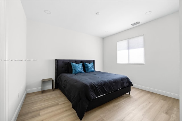 bedroom featuring light hardwood / wood-style floors