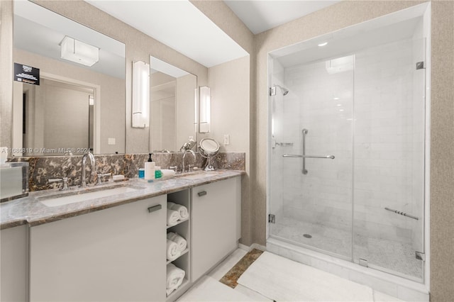 bathroom with vanity, tile patterned floors, and an enclosed shower