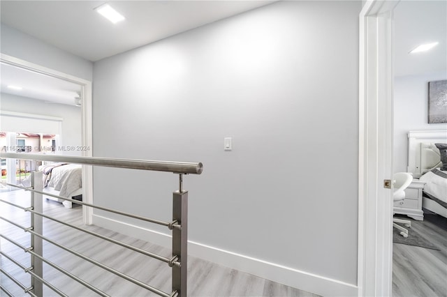 corridor featuring light hardwood / wood-style floors