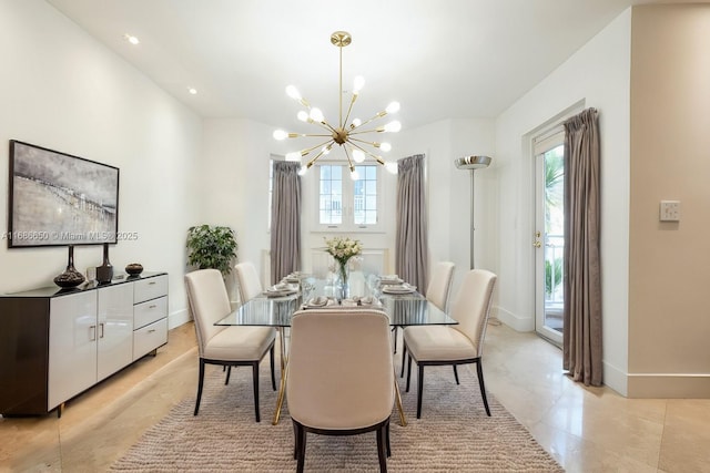 dining space featuring a notable chandelier and plenty of natural light