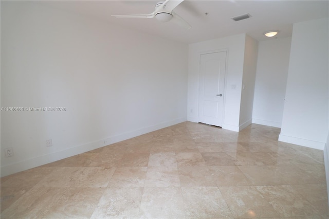 empty room featuring ceiling fan