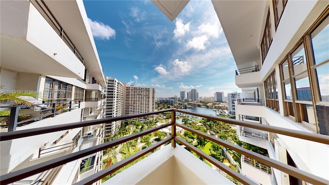 balcony featuring a water view