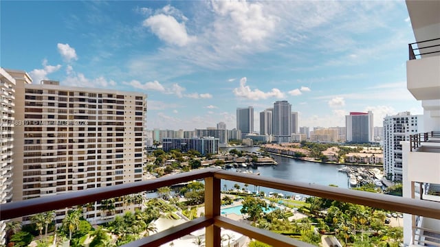 balcony featuring a water view