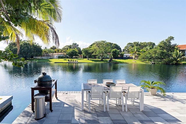 6616 E Miami Lakes Dr E, Miami Lakes, FL 33014 - dock with a water view, a patio, and outdoor dining space