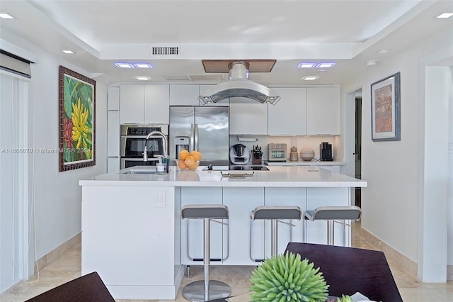 6616 E Miami Lakes Dr E, Miami Lakes, FL 33014 - kitchen featuring appliances with stainless steel finishes, modern cabinets, white cabinets, a center island with sink, and recessed lighting