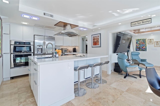 6616 E Miami Lakes Dr E, Miami Lakes, FL 33014 - kitchen with appliances with stainless steel finishes, modern cabinets, a sink, white cabinets, and light countertops