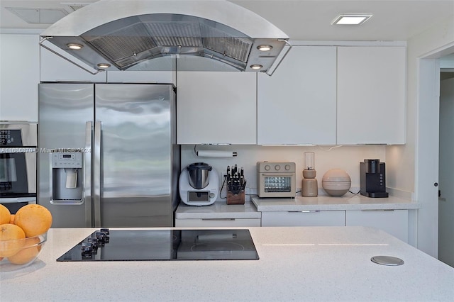 6616 E Miami Lakes Dr E, Miami Lakes, FL 33014 - kitchen featuring stainless steel fridge with ice dispenser, black electric stovetop, white cabinetry, wall chimney range hood, and modern cabinets
