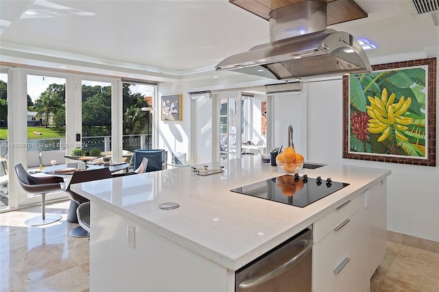 6616 E Miami Lakes Dr E, Miami Lakes, FL 33014 - kitchen with black electric cooktop, island range hood, stainless steel dishwasher, white cabinets, and light stone countertops