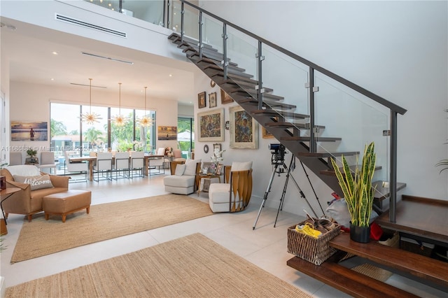 stairs featuring tile patterned flooring