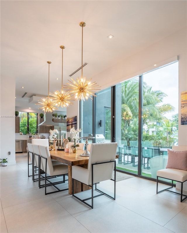 dining area featuring an inviting chandelier