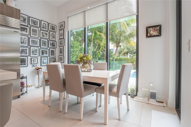 dining area with light tile patterned flooring