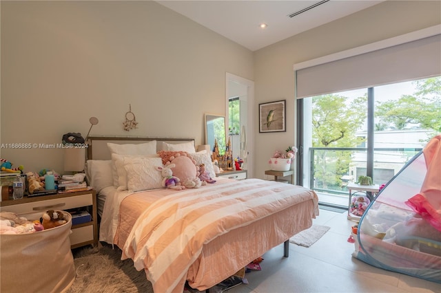 bedroom featuring multiple windows