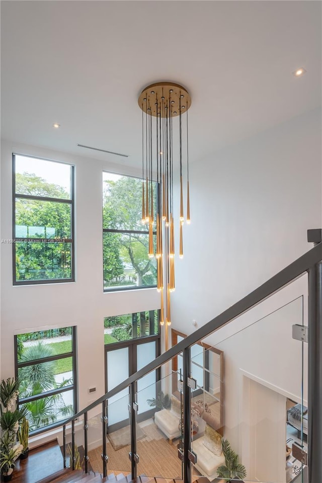 staircase featuring hardwood / wood-style floors