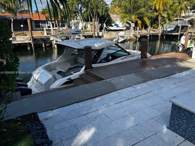 dock area featuring a water view