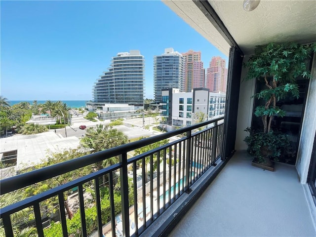 balcony featuring a water view